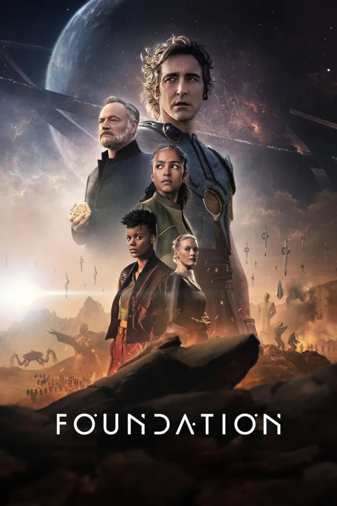 Foundation (Season 2 - Episode 1 Updated) [Download TV Series]In the series, Foundation Season 2 - A complex saga of humans scattered on planets throughout the galaxy all living under the rule of the Galactic Empire. Dr Hari Seldon and his loyal followers attempt to preserve their culture as the galaxy collapses around them.