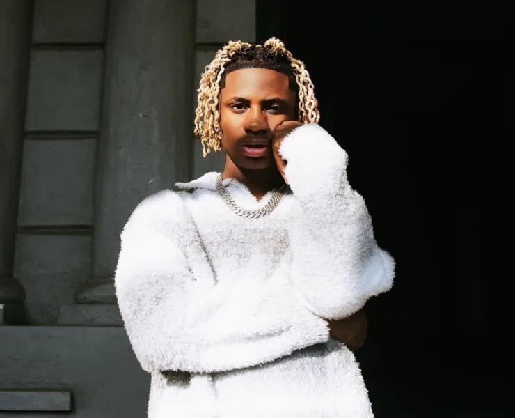 **Artist Spotlight: Khaid - A Rising Star Paving the Way in Afrobeats** In the dynamic realm of Afrobeats, Nigerian artist Khaid, born Sulaimon Shekoni Solomon on December 10, 2004, is emerging as a force to be reckoned with. Currently signed to Neville Records, Khaid's journey to stardom began with the release of "With You" after securing a record deal with Sydney Talker's label in 2022. Hailing from Shibiri-Ojo and raised in a family of ten, Khaid's early life was marked by resilience and determination. Working as a roadside mechanic to support his family and fund his music career, he transitioned from street performances to catching the attention of Sydney Talker, leading to a record deal. His breakout single, "With You," propelled him onto the Nigeria TurnTable Top 50 single chart, debuting at number 48 on February 14, 2022. Khaid's artistic journey unfolds with authenticity, as he converted to Christianity after leaving Islam, a personal evolution that adds depth to his narrative. In April 2022, Khaid dropped "SKI," accompanied by a music video directed by Sydney Talker. The release was praised for offering an honest portrayal of his life before fame. Later that year, on May 27, he unveiled his debut extended play (EP), "DIVERSITY," featuring a vibrant collage of sounds appealing to the young and young-at-heart. Khaid's creative prowess further shines in his recent EP, "Emotions," released on September 1, 2023. Lead singles "Anabella" and "Jolie" showcase his soulful melodies over Afrobeat rhythms, earning him recognition on major charts and platforms. "Jolie" peaked at number 7 on the official Nigeria TurnTable Top 100 songs, and his talent was acknowledged by industry heavyweights like Davido. The artist's impact extends globally, evident in his collaboration prospects, notably spending time with Lil Durk, hinting at potential future collaborations. His most recent single, "Marry Me," featuring viral sensation Shallipopi, adds another layer to Khaid's diverse discography. With an image rooted in spirituality and a desire to shed light on the struggles people face, Khaid's goals include shaping how the world perceives him while delivering impactful music. As Khaid's star continues to rise, his vision encompasses collaborations with industry giants like Burna Boy, Wizkid, Lil Durk, Polo G, Ed Sheeran, and Billie Eilish. In a genre dominated by trailblazers, Khaid is carving his own path, leaving an indelible mark on the ever-evolving landscape of Afrobeats. Keep an eye on this rising star as he unfolds the chapters of his musical journey.