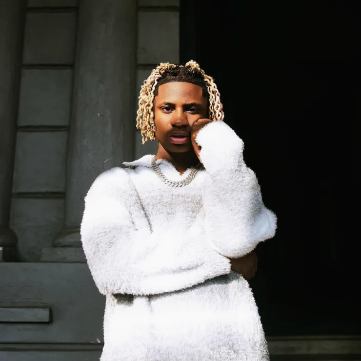**Artist Spotlight: Khaid - A Rising Star Paving the Way in Afrobeats** In the dynamic realm of Afrobeats, Nigerian artist Khaid, born Sulaimon Shekoni Solomon on December 10, 2004, is emerging as a force to be reckoned with. Currently signed to Neville Records, Khaid's journey to stardom began with the release of "With You" after securing a record deal with Sydney Talker's label in 2022. Hailing from Shibiri-Ojo and raised in a family of ten, Khaid's early life was marked by resilience and determination. Working as a roadside mechanic to support his family and fund his music career, he transitioned from street performances to catching the attention of Sydney Talker, leading to a record deal. His breakout single, "With You," propelled him onto the Nigeria TurnTable Top 50 single chart, debuting at number 48 on February 14, 2022. Khaid's artistic journey unfolds with authenticity, as he converted to Christianity after leaving Islam, a personal evolution that adds depth to his narrative. In April 2022, Khaid dropped "SKI," accompanied by a music video directed by Sydney Talker. The release was praised for offering an honest portrayal of his life before fame. Later that year, on May 27, he unveiled his debut extended play (EP), "DIVERSITY," featuring a vibrant collage of sounds appealing to the young and young-at-heart. Khaid's creative prowess further shines in his recent EP, "Emotions," released on September 1, 2023. Lead singles "Anabella" and "Jolie" showcase his soulful melodies over Afrobeat rhythms, earning him recognition on major charts and platforms. "Jolie" peaked at number 7 on the official Nigeria TurnTable Top 100 songs, and his talent was acknowledged by industry heavyweights like Davido. The artist's impact extends globally, evident in his collaboration prospects, notably spending time with Lil Durk, hinting at potential future collaborations. His most recent single, "Marry Me," featuring viral sensation Shallipopi, adds another layer to Khaid's diverse discography. With an image rooted in spirituality and a desire to shed light on the struggles people face, Khaid's goals include shaping how the world perceives him while delivering impactful music. As Khaid's star continues to rise, his vision encompasses collaborations with industry giants like Burna Boy, Wizkid, Lil Durk, Polo G, Ed Sheeran, and Billie Eilish. In a genre dominated by trailblazers, Khaid is carving his own path, leaving an indelible mark on the ever-evolving landscape of Afrobeats. Keep an eye on this rising star as he unfolds the chapters of his musical journey.