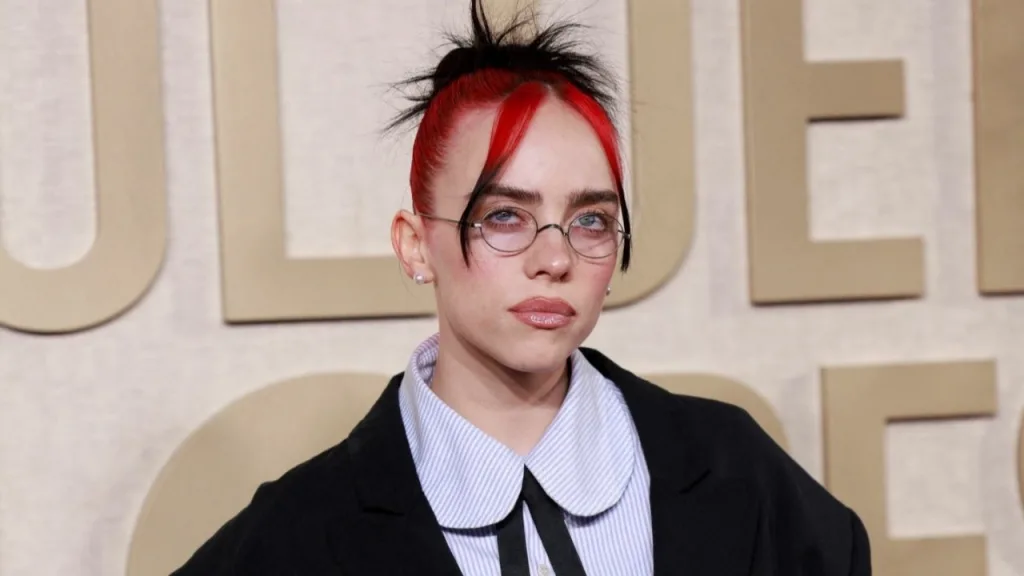 tumblree18f460eb8cfc10cfdce0ebdab3615722bee00c1280 Critic Circle Billie Eilish has revealed her upcoming album titled 'Hit Me Hard and Soft', ending a three-year hiatus since her last release. Scheduled to drop on May 17th, the album, represented by Eilish submerged underwater beneath a white wooden door on its cover, is designed to be experienced as a cohesive journey from start to finish. Eilish expressed her eagerness for fans to hear the album in its entirety, opting not to release singles beforehand.Teasing the album's arrival on Instagram with cryptic images and messages, Eilish has been building anticipation among her followers. 'Hit Me Hard and Soft' will mark her third studio album, succeeding 2021's 'Happier Than Ever' and her debut, 'When We All Fall Asleep, Where Do We Go?' in 2019.Despite the gap between albums, Eilish has kept her fans engaged with intermittent releases such as the surprise EP 'Guitar Songs' in 2022 and her contribution to the Barbie soundtrack with "What Was I Made For?" in the previous year, which garnered critical acclaim and prestigious awards.In an effort towards sustainability, the album will be available in various vinyl formats made from recyclable materials. Eilish, who recently discussed sustainability in the music industry, clarified her stance, emphasizing the collective responsibility of artists and fans in combating climate change.