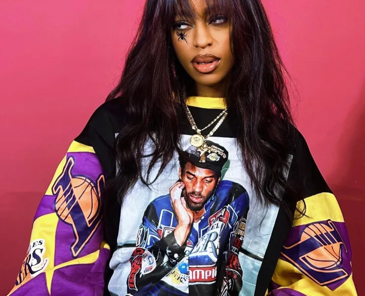 Qing Madi, an emerging Afrobeats sensation, is capturing attention with the release of a music video for the remix of her track "Vision," featuring the acclaimed American artist, Chlöe Bailey.