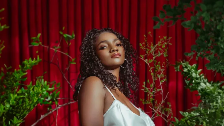Simi Announces Release Date for New Album "LOST AND FOUND" 24 Photo-by-Simi-on-April-18-2024.-May-be-an-image-of-one-or-more-people-makeup-slip-gown-and-dress