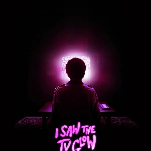 In the movie, I Saw the TV Glow - Teenager Owen is just trying to make it through life in the suburbs when his classmate introduces him to a mysterious late-night TV show — a vision of a supernatural world beneath their own. In the pale glow of the television, Owen’s view of reality begins to crack.