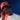 a man with braces wearing a beanie and a necklace Mikon Asuquo